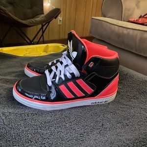 Hot pink high top Adidas
